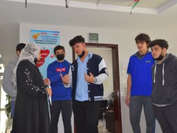 GR-12-Boys giving donation at Sharjah City for HumanitarianServices